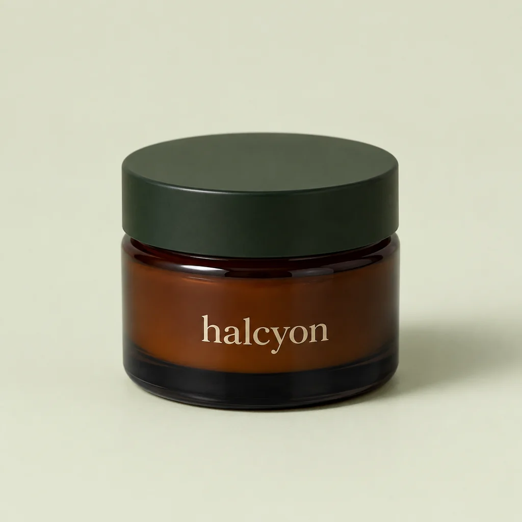 Smoked amber weather salve jar with a dark lid