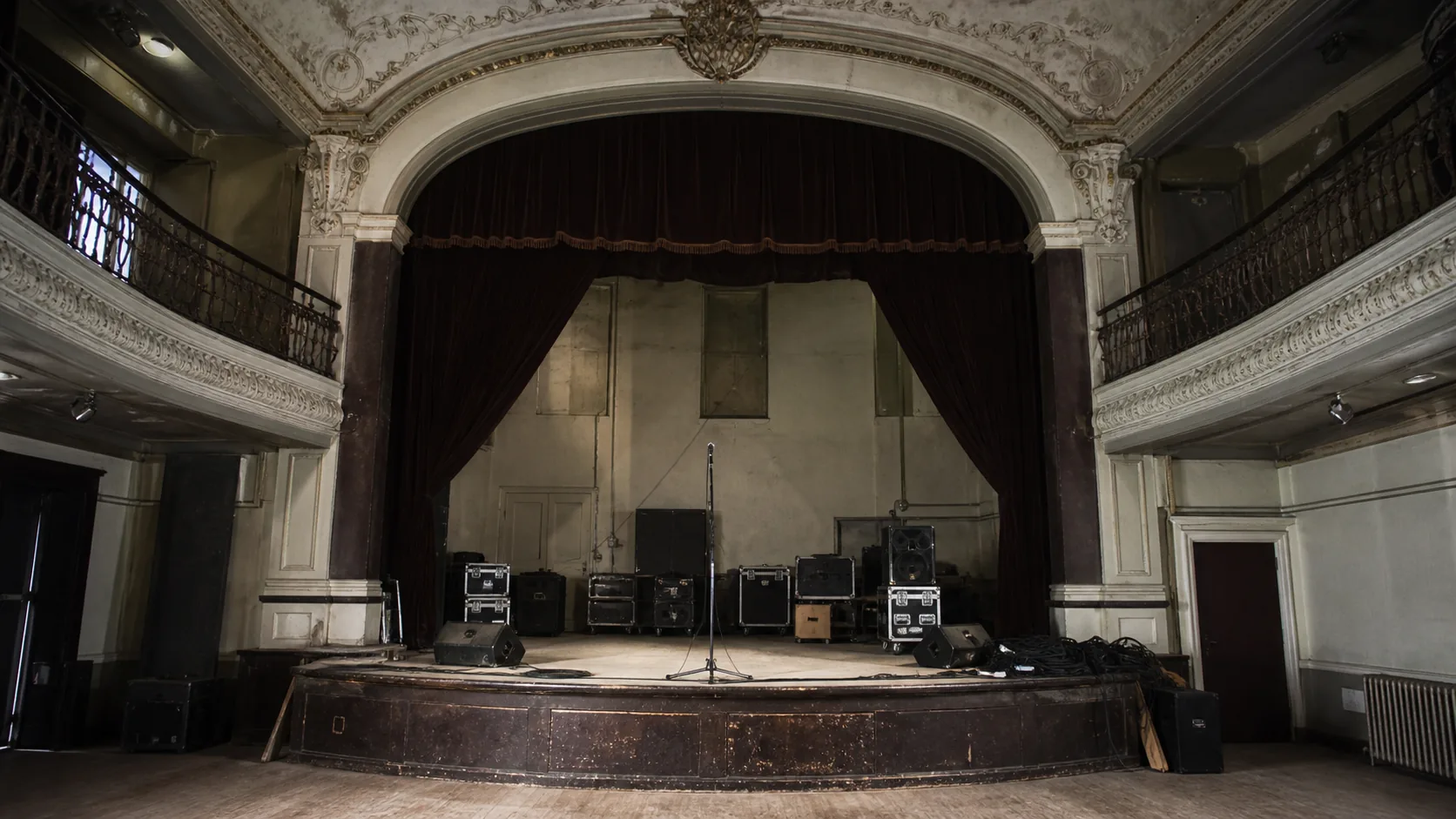 The original concept’s empty stage, ornate plasterwork and worn floorboards